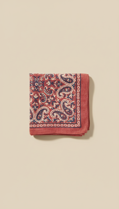 A classic bandana with a vintage print, made from soft, retro fabric. The bandana is centered on a neutral Classic Cream...