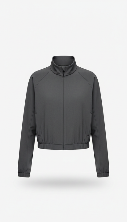 Metro Sand cropped performance jacket, concrete wall in Metro Sand or Concrete Blue). Lighting remains natural and even to...