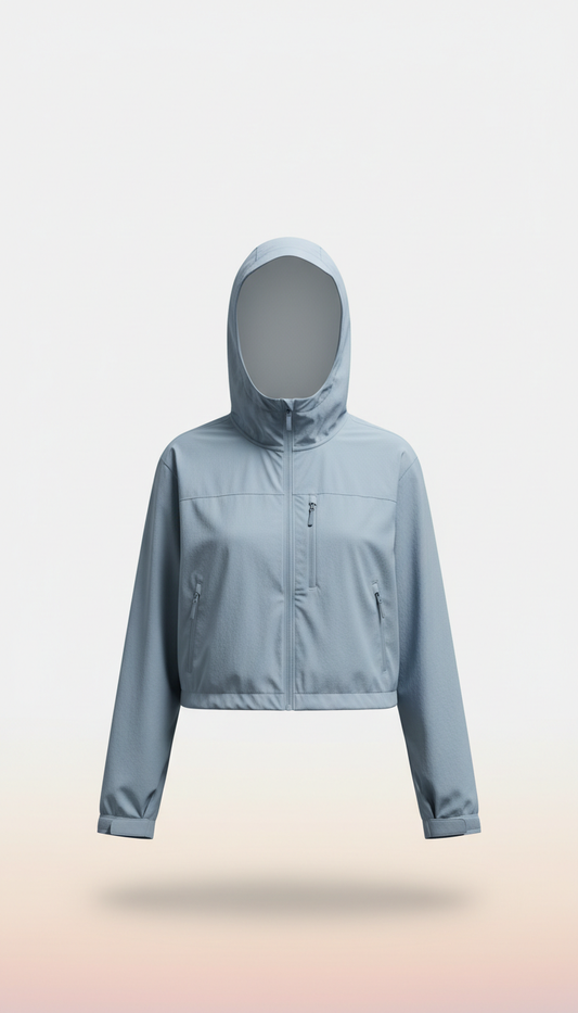Cropped misty sky jacket, Single product at a time—3/4 angle or perfect side profile on matte plinths in Soft Dawn Peach...