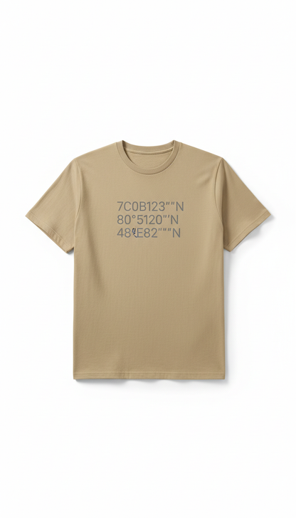 Desert Sand premium cotton tee with tonal Urban Grey map coordinates print, Default angle is straight-on chest-high (for...