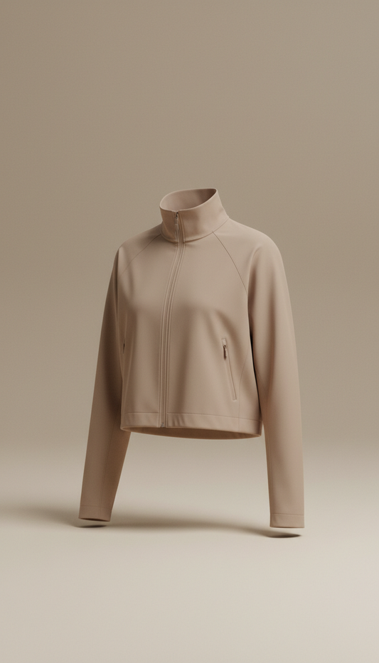 Minimalist cropped performance jacket, Primary angle: three-quarter view at eye-level, emphasizing garment fit on body...